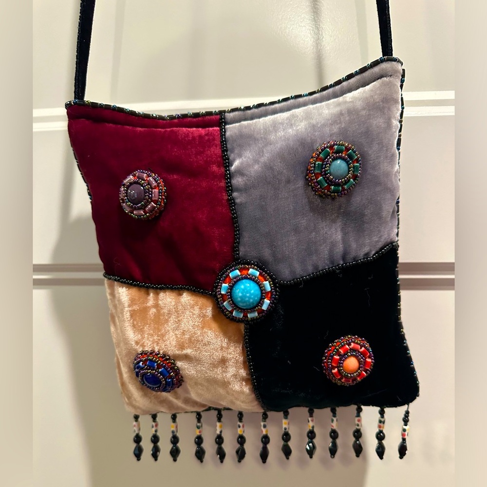Beautiful delicate silk velvet purse.  Exquisite beading all sides, Silk lined.